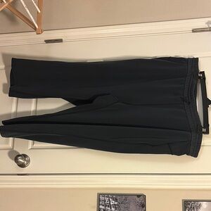 Lululemon soft stream cropped pants. Gray/Black: size 18.